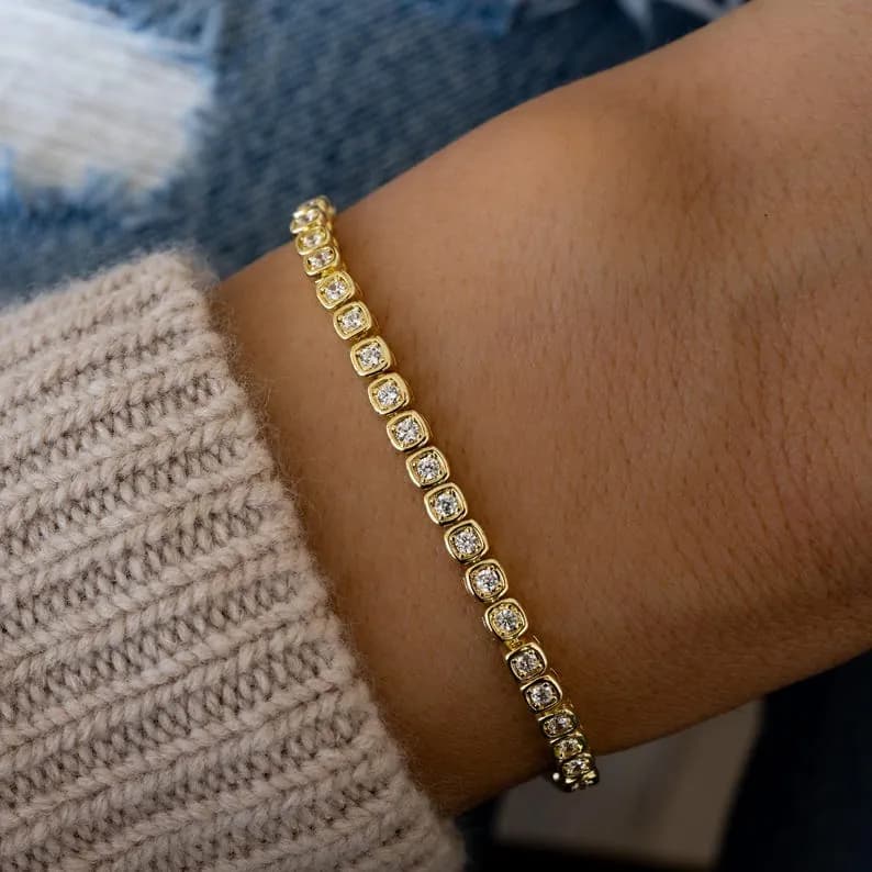 Gold tennis bracelet with cubic zirconia stones