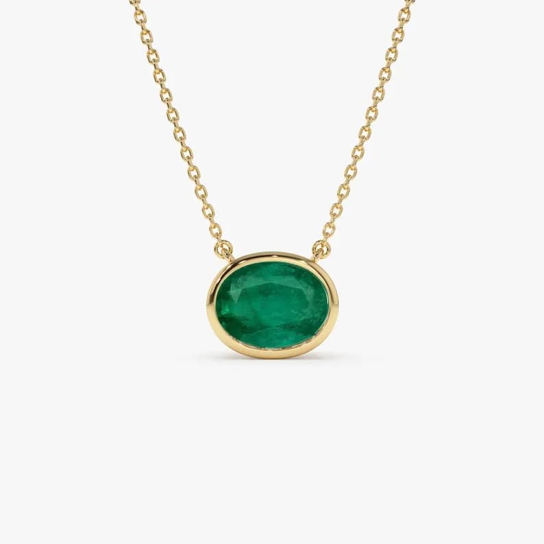 14k Gold Oval Shaped Emerald Necklace in Bezel Setting